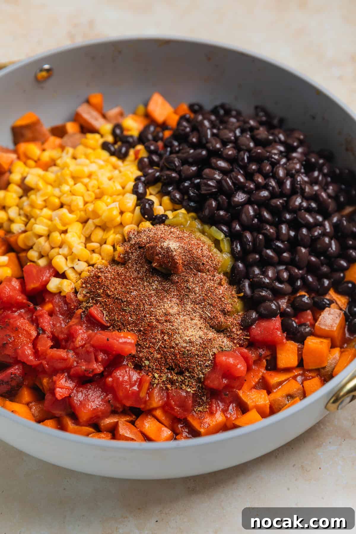 One-Pan Ground Turkey and Sweet Potato Skillet 7 Black beans, corn, tomatoes and seasoning added to skillet with cooked sweet potatoes.