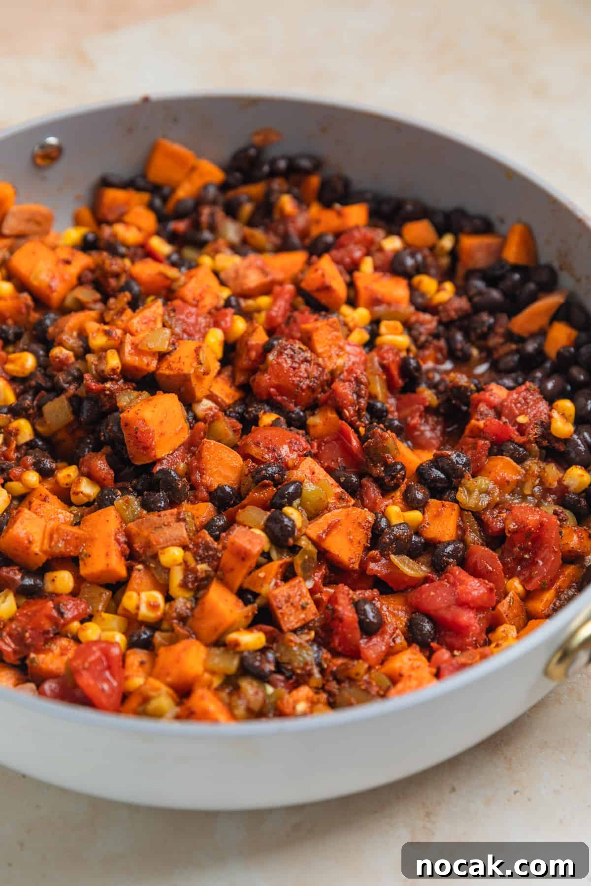 One-Pan Ground Turkey and Sweet Potato Skillet 8 Skillet dinner ingredients in pan combined.