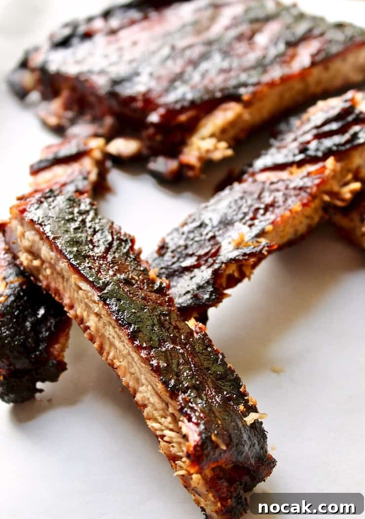 St. Louis-Style BBQ Ribs Recipe for Tender, Sticky Glaze 2 BBQ pork spareribs cut into sections.